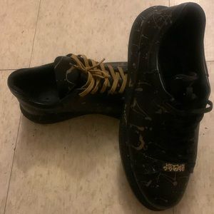 Comfortable pair of shoes. Casual fit. Black and gold strings. Trying to sell.